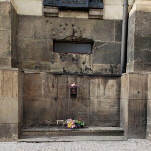 Prague WW2. Bullet holes on the window after Nazis are still visible