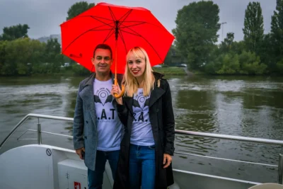 Bohemian Alternative Tours hosts on a river boat in Prague, showing the human, hands-on approach behind successful corporate events