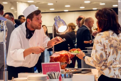Live carving station at a corporate event in Prague, showing how MICE Prague delivers refined service without feeling overly formal