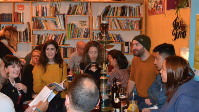 "Guests enjoying a relaxed night out in Letná with drinks and great company on our Prague tour